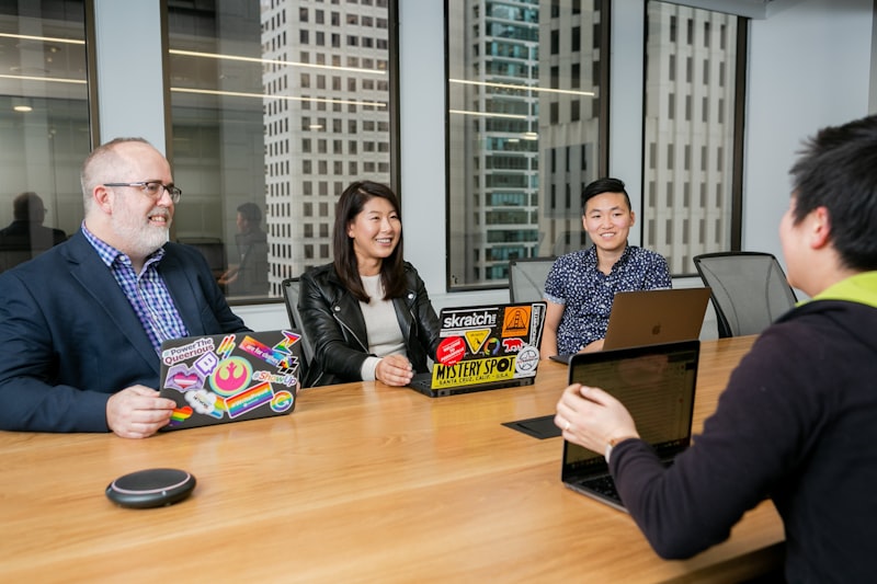 people in a design meeting in an office boardroom 