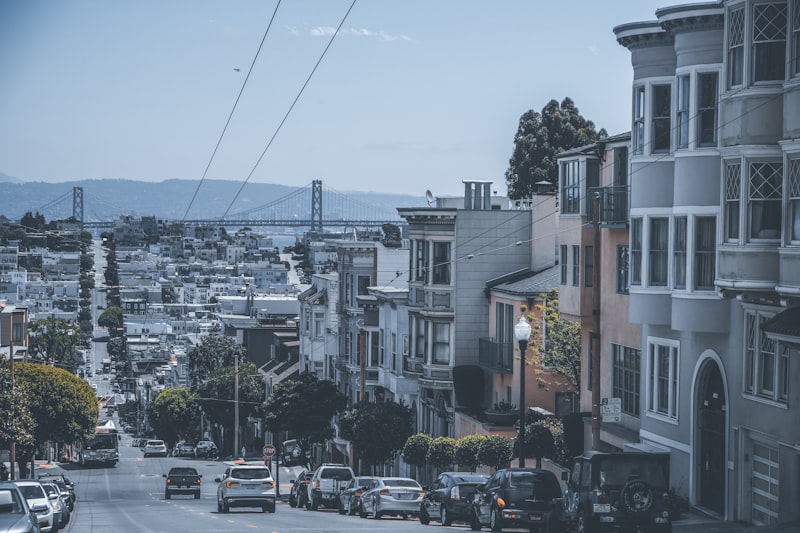 road between houses at daytime