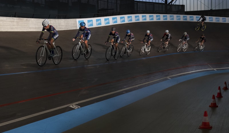 group of men riding bicycle