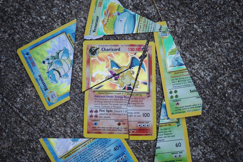 a bunch of pokemon cards laying on the ground