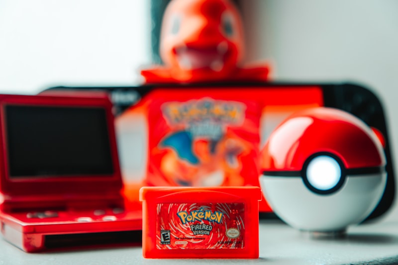 Pokemon game cartridge and accessories on-the-go gaming console