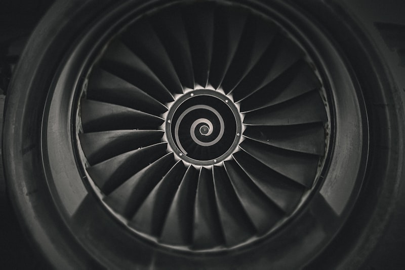 a black and white photo of a jet engine