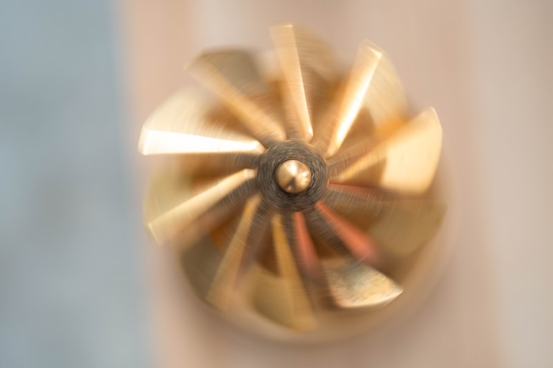 Close-up of a spinning golden turbine
