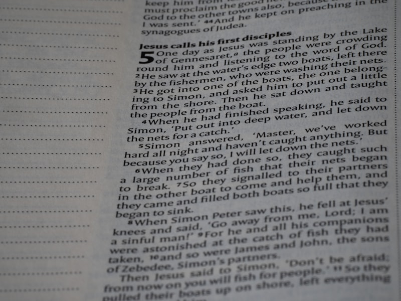 A close up of an open book with text