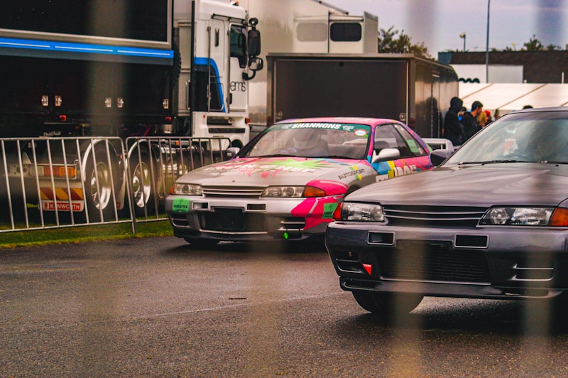 a couple of cars parked next to each other
