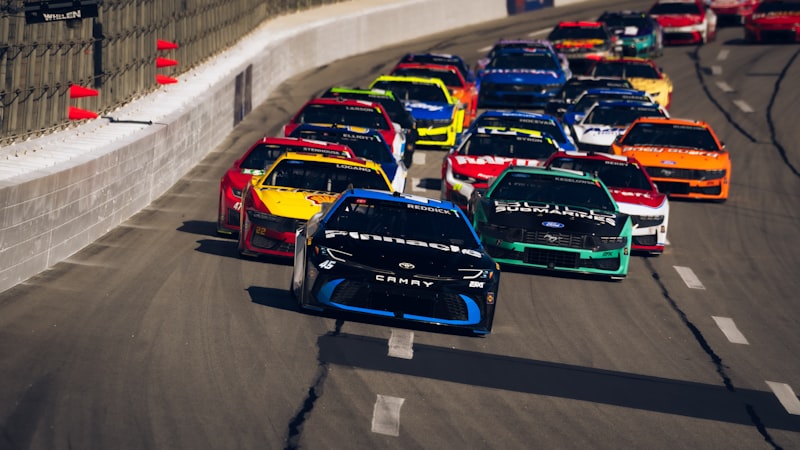 Race cars speeding around a track