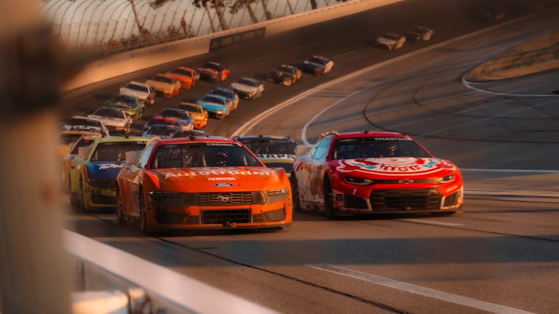 Race cars competing on a track during a race.