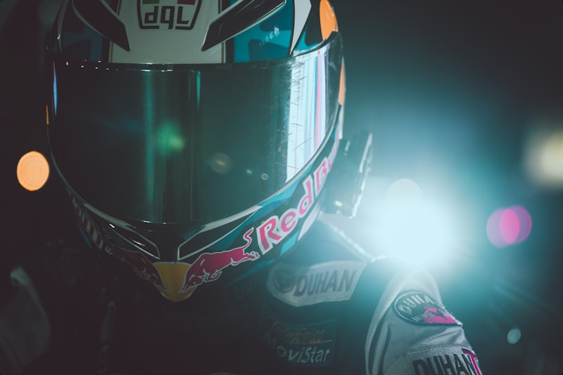 a close up of a person wearing a motorcycle helmet