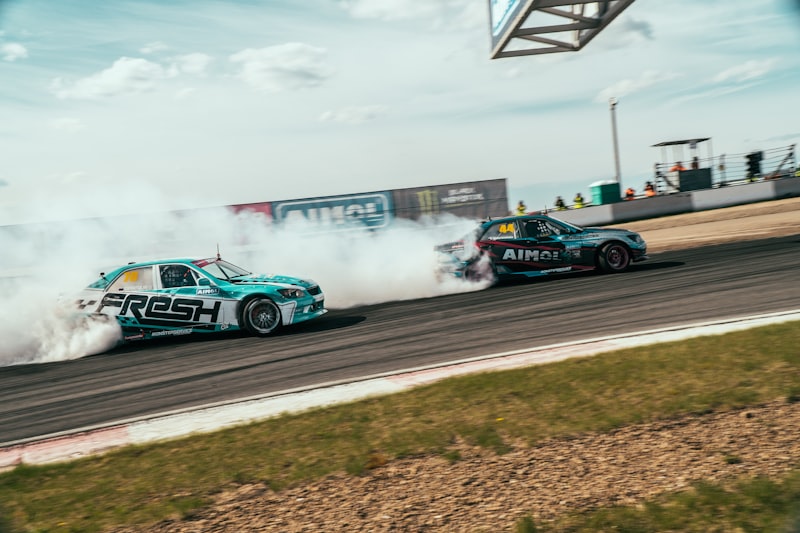 a couple of cars that are on a track