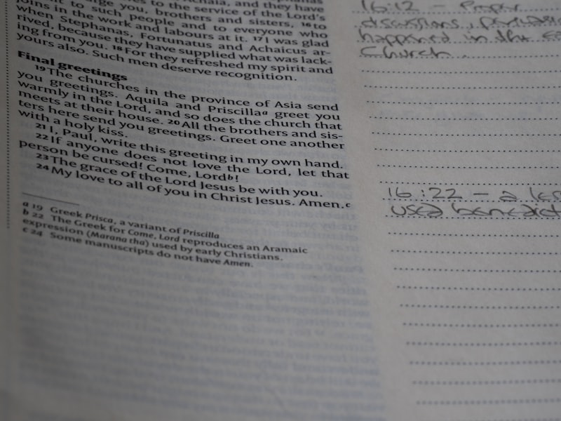 A close up of a book with writing on it