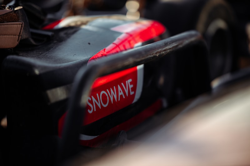 a close up of a red and black motorcycle