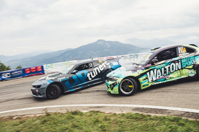 a couple of cars that are on a track