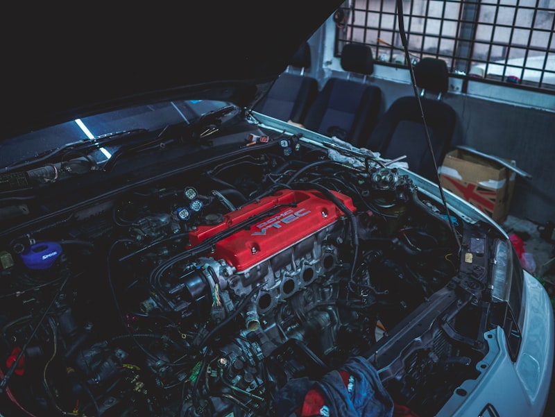 black car engine in a room