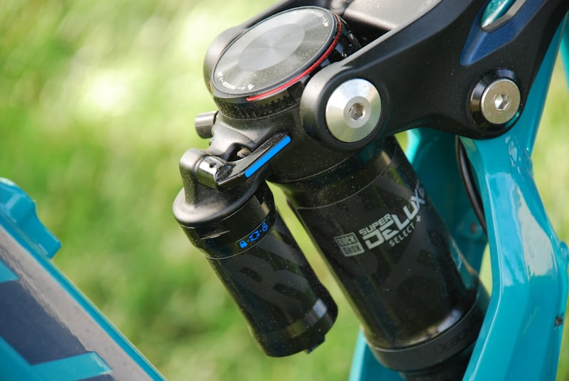 a close up of a bike handle with a light on it