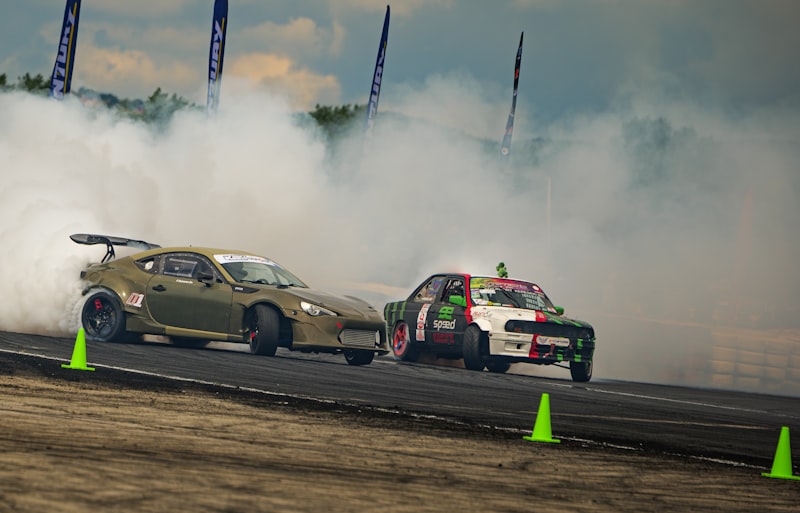 a couple of cars that are on a track