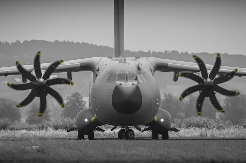 Large cargo plane with propellers on tarmac