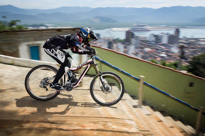 person riding bicycle on staircase