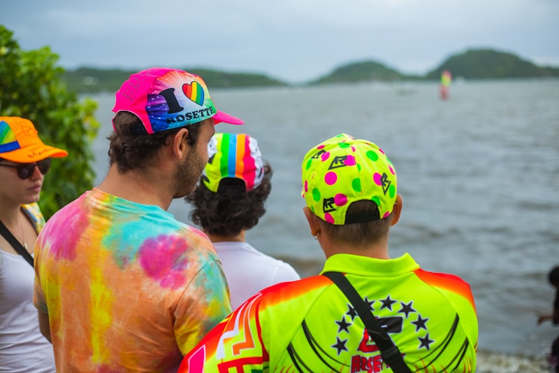 a group of people wearing colorful hats